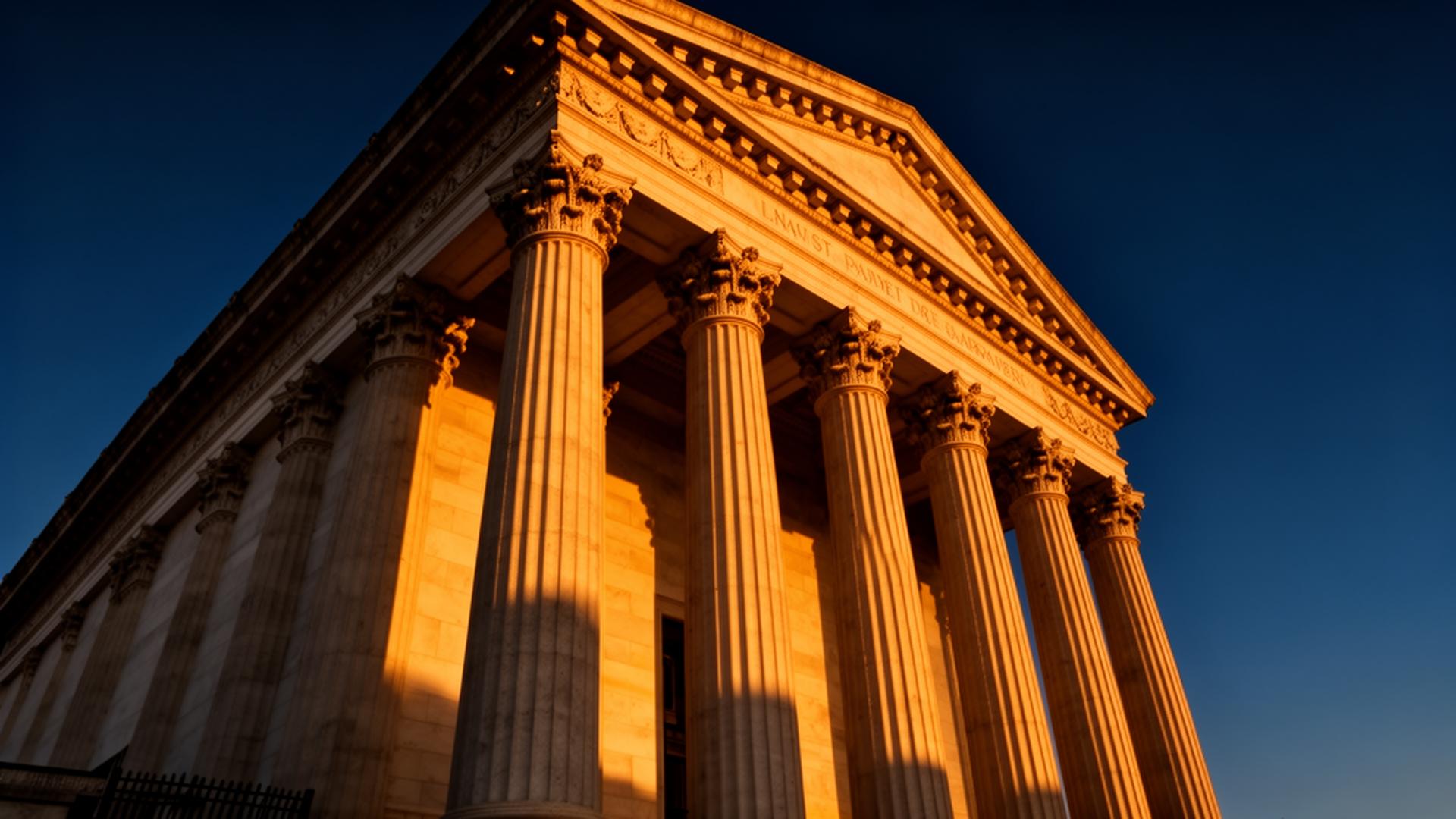 Classical courthouse columns at golden hour